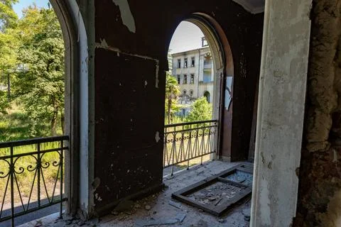 Georgia Tskaltubo abandoned soviet luxury sanatory buildingarc window Stock Photos