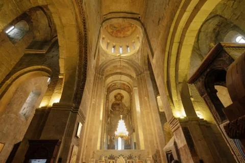 Georgian church inside, bottom view. vault and old painting. altar. Stock Photos