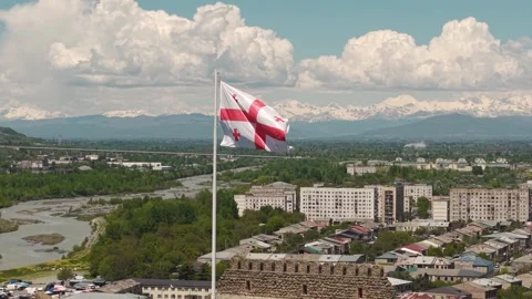 Georgian Flag Waving Over Gori Cityscape Stock Footage 346188917