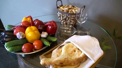 Georgian table with vegetables and lavash Stock Footage 78035367