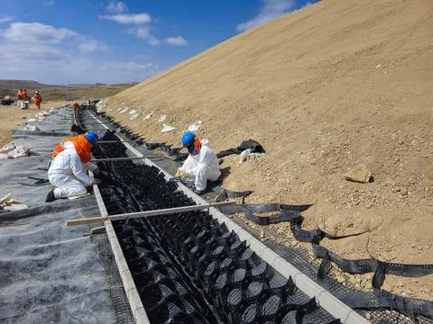 Geosynthetic installation process in the construction of storm drains in mi.. Stock Photos