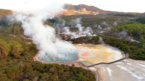 Geothermal Landscape with hot boiling mud and sulphur springs due to volcanic Video stock 128695868