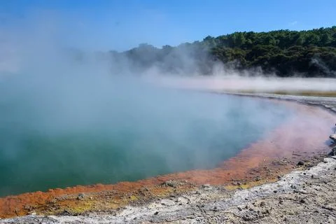 Geothermal Landscape with hot boiling mud and sulphur springs due to volcanic Stock Photos