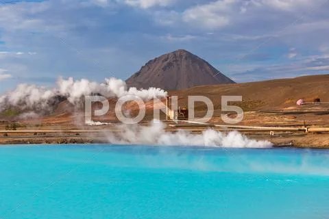 Geothermal power station and bright turquoise lake in iceland Stock Photos