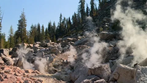 Geothermal steam venting from Bumpass Hell in Lassen Volcanic National Park in Video stock 337654995