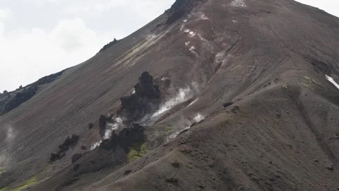 Geothermal Steam Venting from Volcanic Mountain in Landmannalaugar, Iceland Stock Footage 339964436