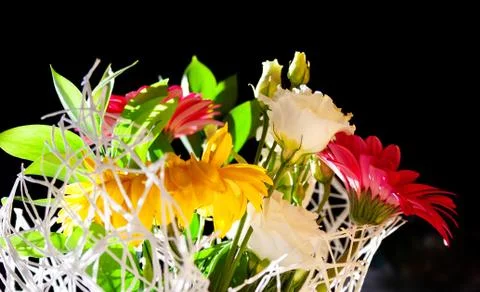 Gerbera, eustoma, lisianthus - bright multi-colored bouquet isolated on a black Stock Photos