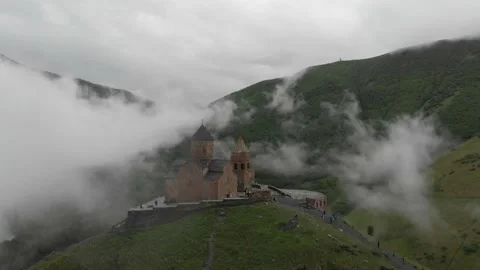 Gergeti Trinity Church, Caucasus mountains, Kazbegi, Stephantsminda, Georgia Stock Footage