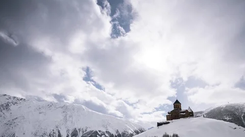 Gergeti Trinity Church Or Tsminda Sameba - Holy Trinity Church Near Village Of Stock Footage 105126956
