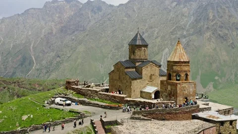 Gergeti Trinity Church Or Tsminda Sameba Holy Trinity Church In Georgia. Stock Footage 220124815