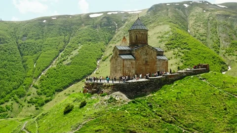 Gergeti Trinity Church Or Tsminda Sameba Holy Trinity Church in Georgia. Stock Footage 220125730