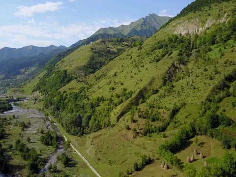 Gergeti Trinity Church, Tsminda Sameba Gergeti Georgia Europe mountains cows Stock-Footage 81379830