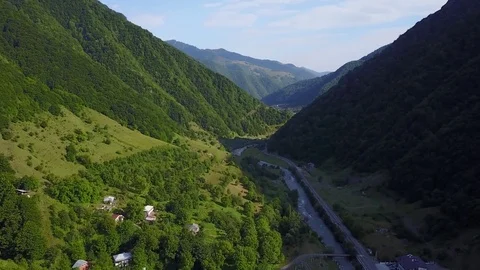 Gergeti Trinity Church, Tsminda Sameba Gergeti Georgia Europe mountains cows Stock Footage 81379870