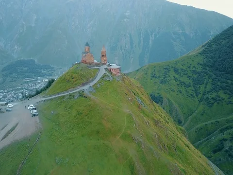 Gergeti Trinity Church, Tsminda Sameba Gergeti Georgia Europe Alpine  스톡 동영상 81380205