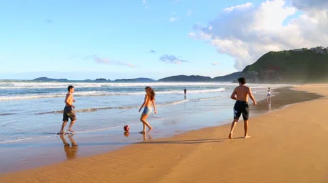 Geriba Beach - Teens play with ball (1920x1080).mp4 Stock Footage