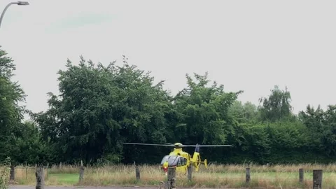 German  ADAC rescue helicopter taking off in slow motion Stock Footage 201879595