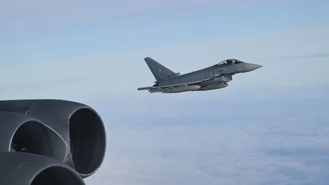German Air Force Eurofighter EF-2000 Typhoon flying with U.S. Air Force B-52 Stock Footage 292778256
