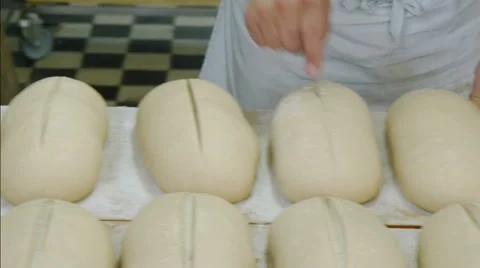 German baker cut bread dough 4k 11685 Stock Footage 55388486