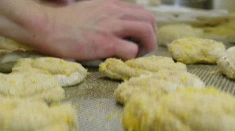 German baker making special roll buns super close 4k 11709 Stock Footage 56085146