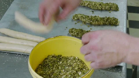 German baker prepare special roll buns 4k 11694 Stock Footage 55630570