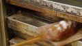 german baker pulls huge bread from the oven 4k or 4k+ Resolution