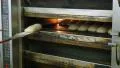 german bakery fill up an oven with bread 4k 11696 4k or 4k+ Resolution