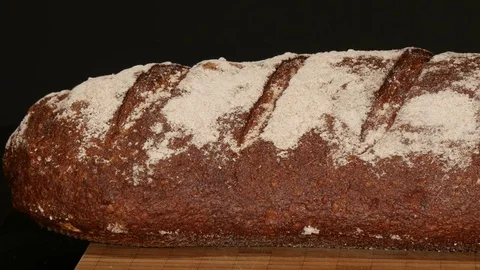 German bread: pan along huge traditional bread urbrot Stock Footage 85309429