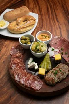 German cold cuts tapas snack platter with meats and bread Stock Photos