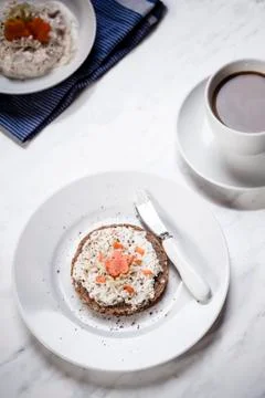 German dark multi-grain bread with cream cheese and carrots, cup of coffee Stock Photos