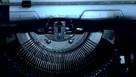 GERMAN DEMOCRATIC REPUBLIC being typed on vintage typewriter at night Stock Footage 185148917