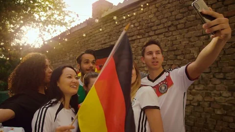 German Fans taking a selfie Stock Footage 102942012