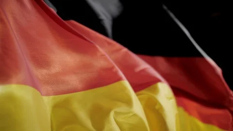 German flag on black background slow motion Stock Footage 111863817