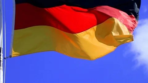 A German flag blows in the wind Stock Footage 112036886