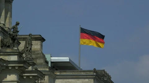 German Flag by the Brandenburg Gate in Berlin Stock Footage 95847738