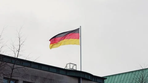 German Flag on a Building Rooftop Stock Footage 264220402