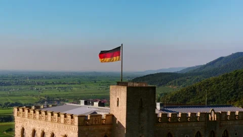 German Flag of the Castle Blowing in the Wind on Sunny Day Stock Footage 166146949