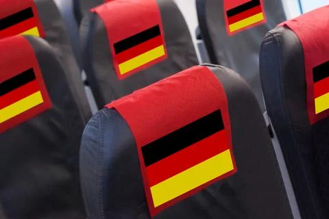 German Flag on Empty seat in plane. Travel, flight and transportration in G.. Stock Photos