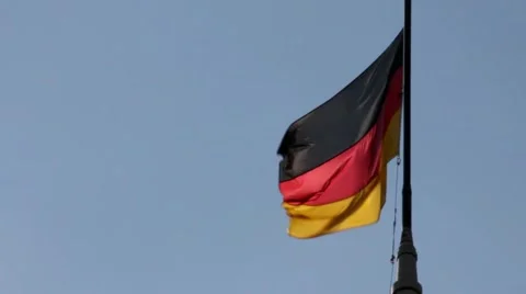 German flag with fabric structure against a blue sky Stock-Footage 41721368