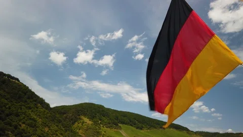 A German Flag flying in slow motion Vídeo Stock 113120745