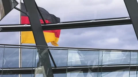 German flag on the German Parliament on a cloudy day Stock-Footage 322942448