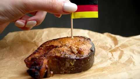 German flag in grilled fish, symbol of local German seafood production. Stock Footage 323012725