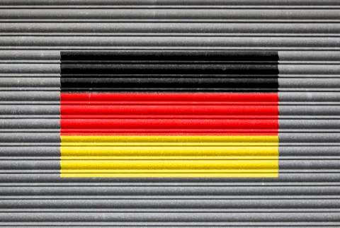 German Flag On Metal Shutter Stock Photos