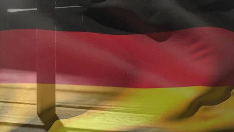 German flag mounted on metal pole undulating in breeze casting moving shadows Stock Footage 311916428