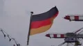 German flag on a sightseeing boat moving in the wind HD Footage