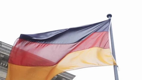 German Flag waving during cloudy day in Berlin. Stock Footage