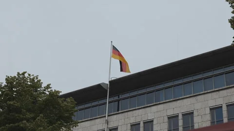 A German flag waving on top of a building. Stock Footage 302191172