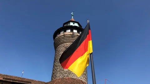 German flag waving on the wind in Nuremberg Stock Footage 90888605