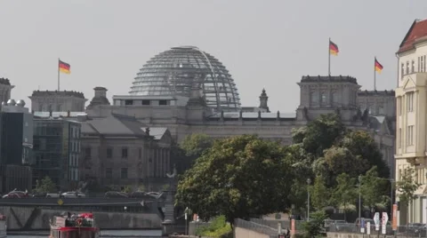 German flags fluttering at the Reichstag, Berlin Stock Footage 68697976
