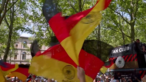 German flags waving over the crowd of football fans Stock Footage 277943801