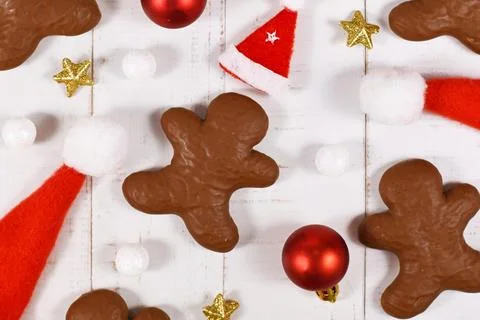German gingerbread glazed with cocolate in shape of men between Christmas Stock Illustration